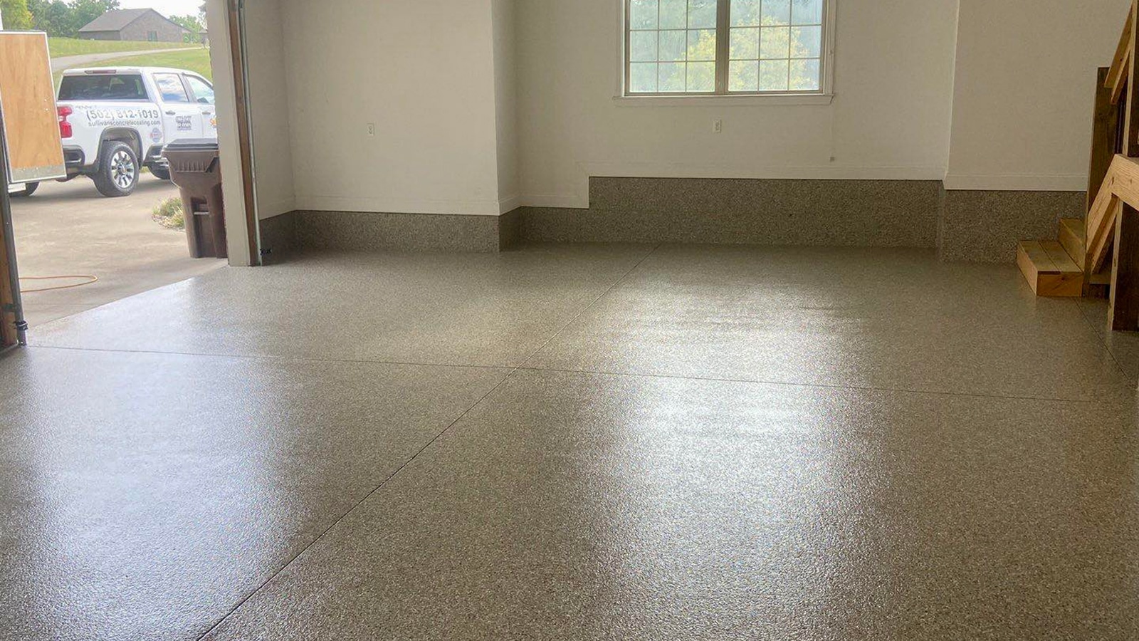 Flake garage floor coating that increases home value, featured in Sullivan's Concrete Coatings blog