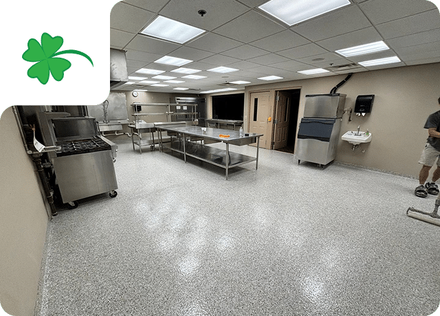Commercial kitchen with seamless cove base flooring installed by Sullivan's Concrete Coatings