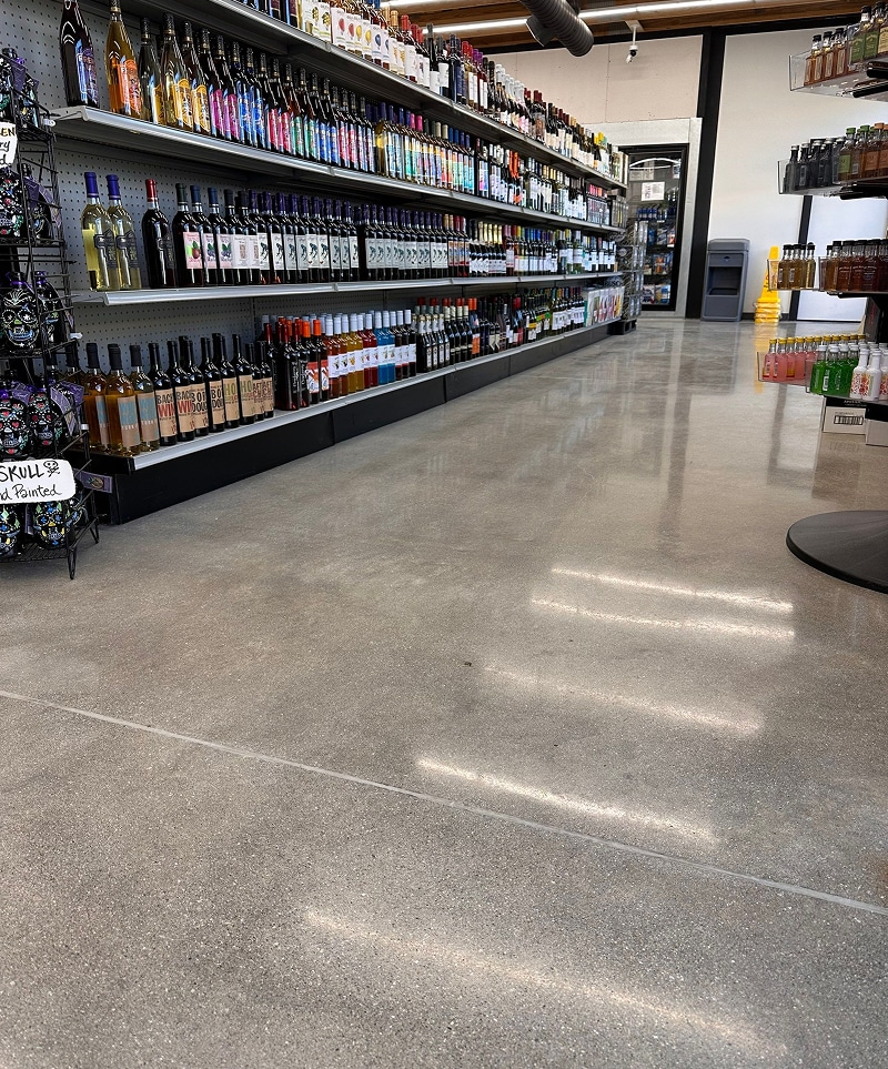 Glossy polished concrete flooring in a Louisville, Kentucky liquor store by Sullivan's Concrete Coatings